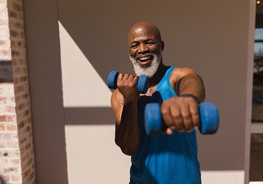 An elderly man exercising