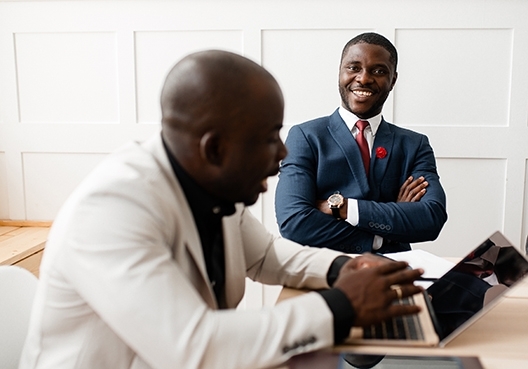Two work colleagues talking